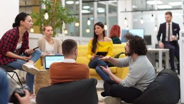 An image of people sitting around talking