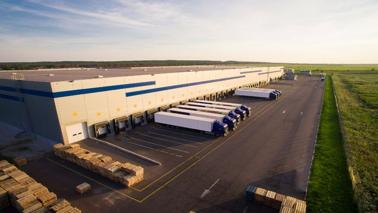 An aerial image of a large warehouse with dock level loading doors
