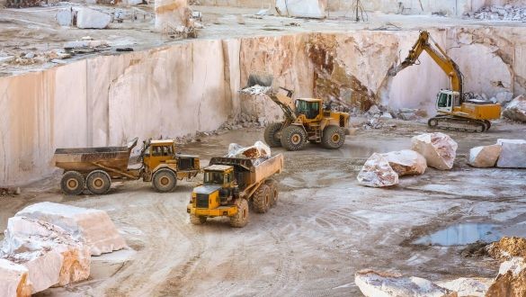 Heavy machinery and excavator in construction site