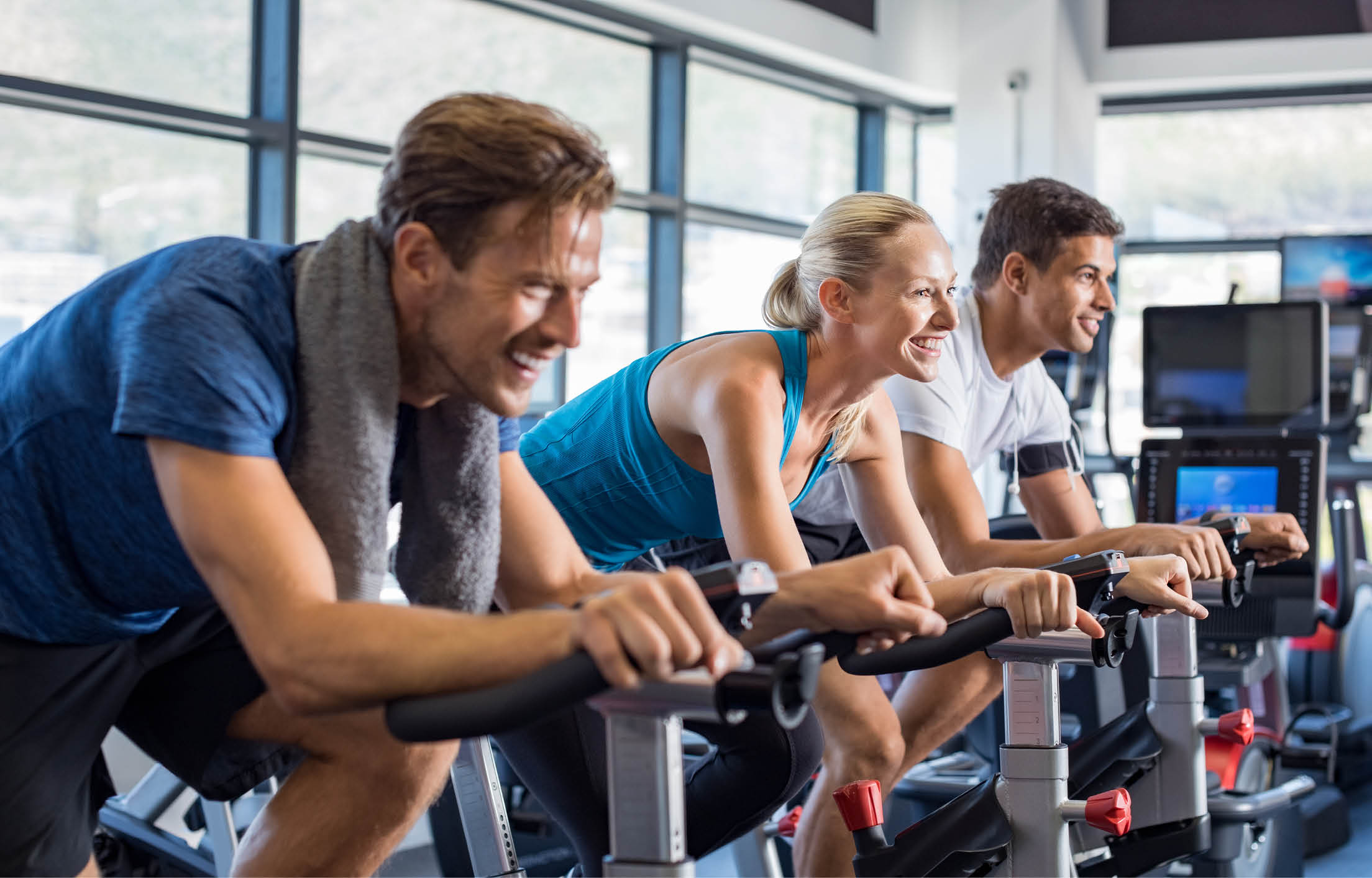 An image of a group of people working out at the gym