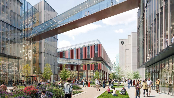 Modern multi-story office and life sciences building in Liverpool with geometric facade featuring square windows. Surrounded by landscaped gardens and people walking, under a partly cloudy sky.