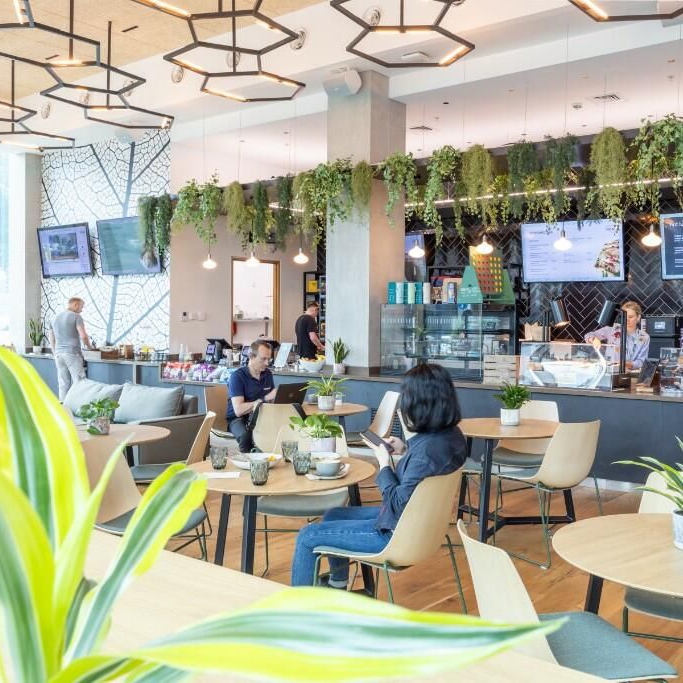 People sat in cafe area at Knowledge Quarter Liverpool
