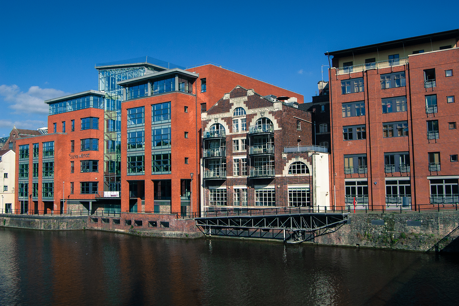 Red brick quayside commercial properties beside Bristol Docks
