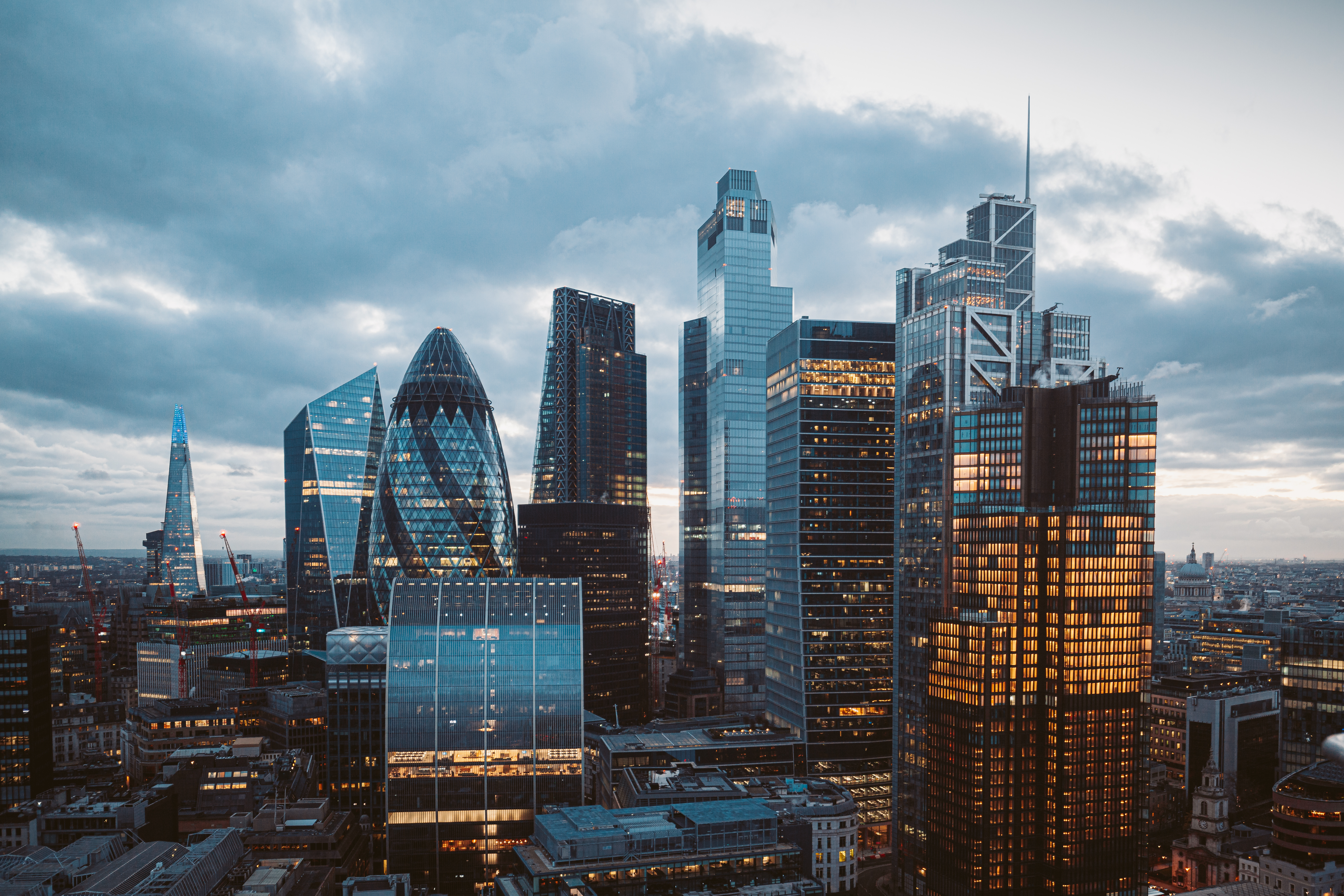 City of London skyline with tall glass buildings at dusk