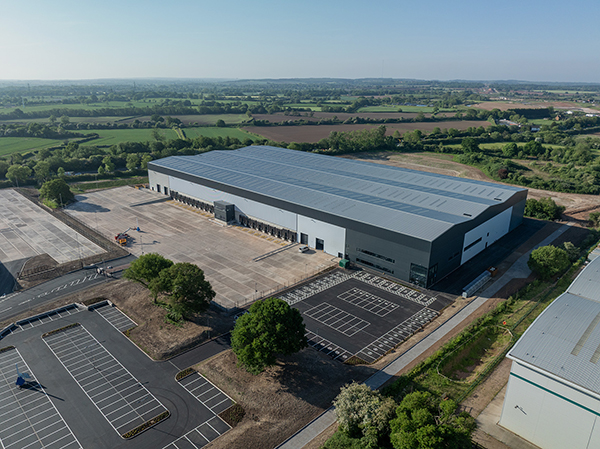 An aerial image of a large warehouse building
